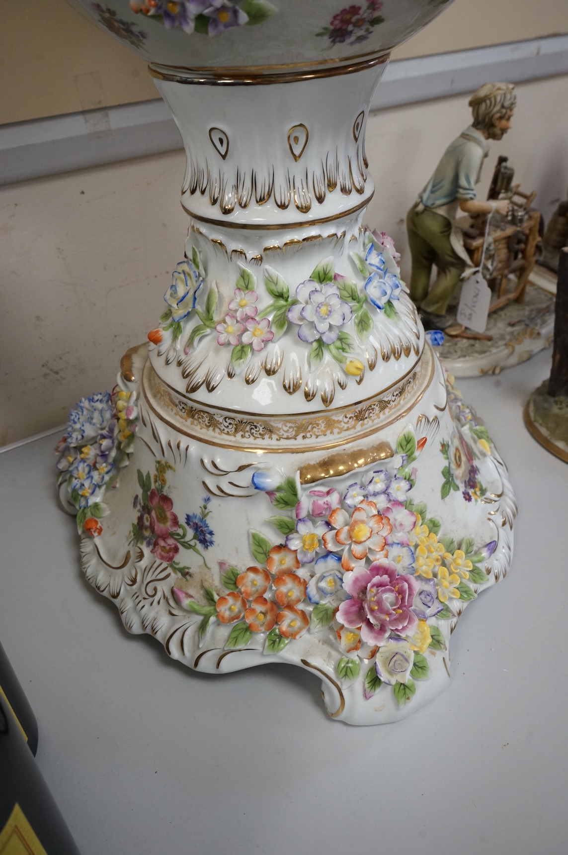 A large 20th century German porcelain two-handled pedestal vase and cover, 89cm